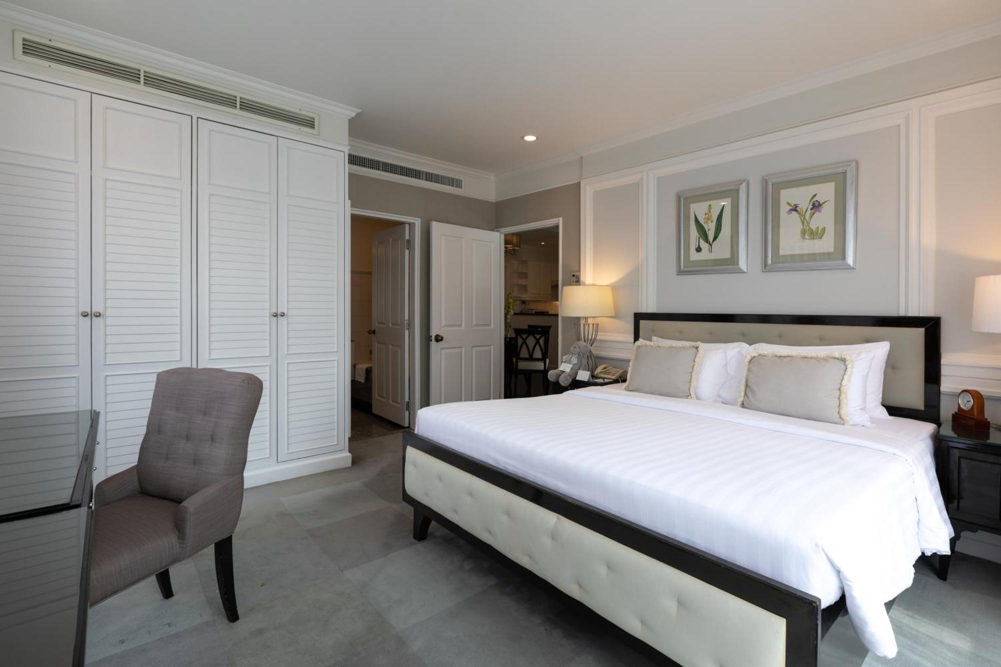 ケープ ハウス ランスアン ホテル バンコク都 エクステリア 写真 A bedroom at The Peninsula Bangkok