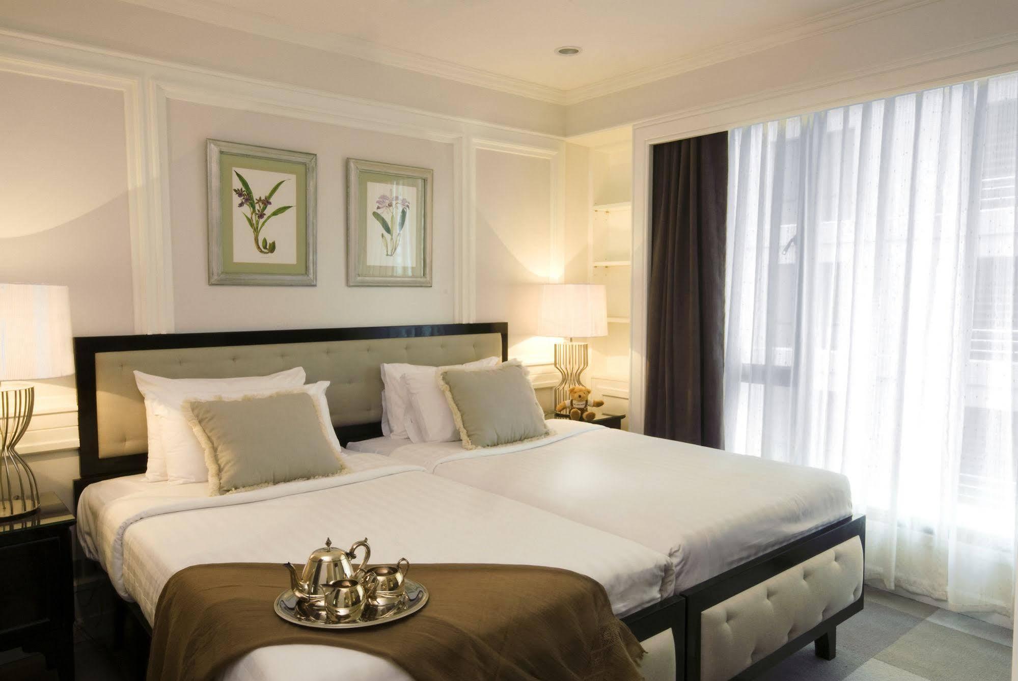 ケープ ハウス ランスアン ホテル バンコク都 エクステリア 写真 A bedroom at the hotel